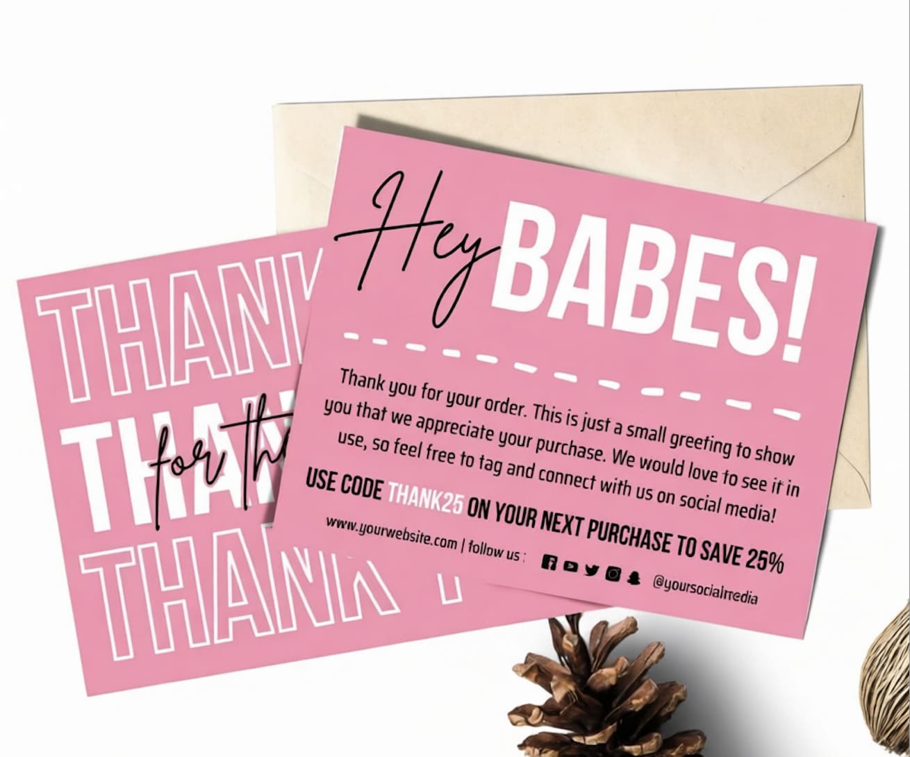 Hands holding a beautifully designed thank you card from an opened package