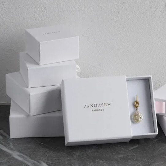 Jewelry drawer box with foil stamping and ribbon pull