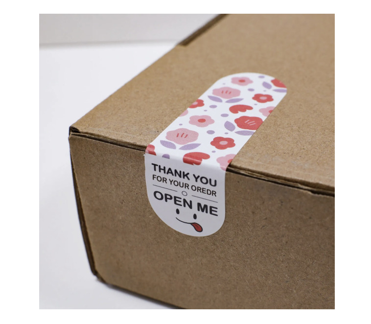 Thank you sticker on mailer box flap