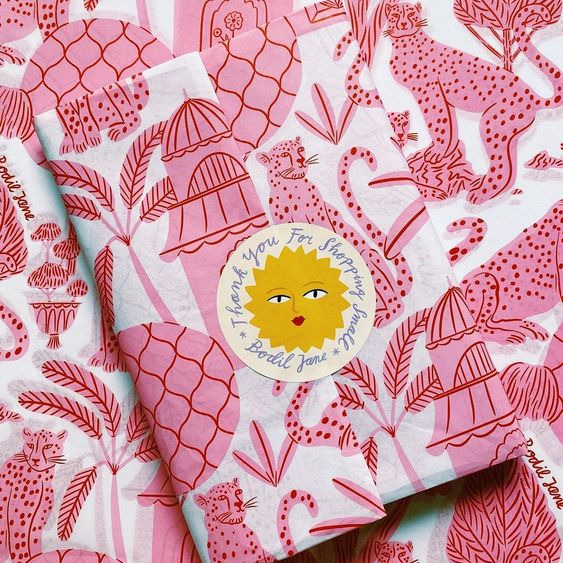 Stack of various colored and printed tissue papers