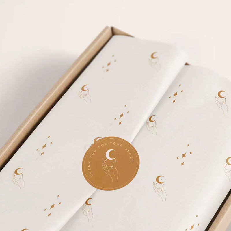 Minimalist centered logo on white tissue paper