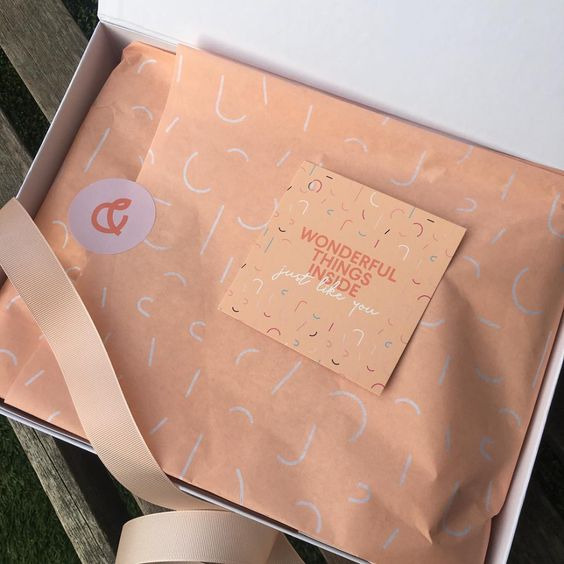 Luxury unboxing experience with branded tissue paper